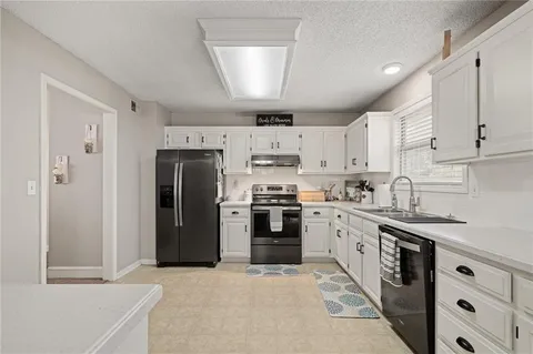 $310,000 | 303 Kimberly Drive, Belton, MO 64012