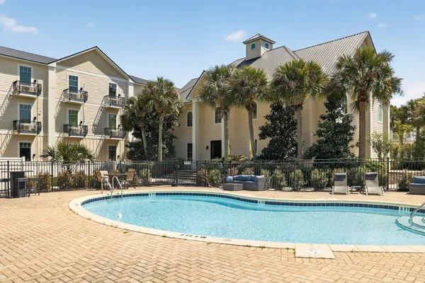 a view of a house with a swimming pool