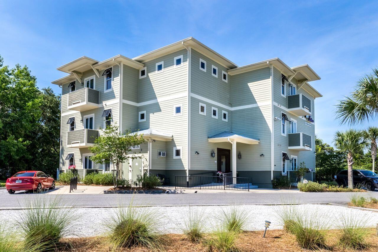 6904 West County Highway 30A, Unit MULTIPLE Santa Rosa Beach, FL 32459 - Photo 6 of 16 a front view of a multi story residential apartment building