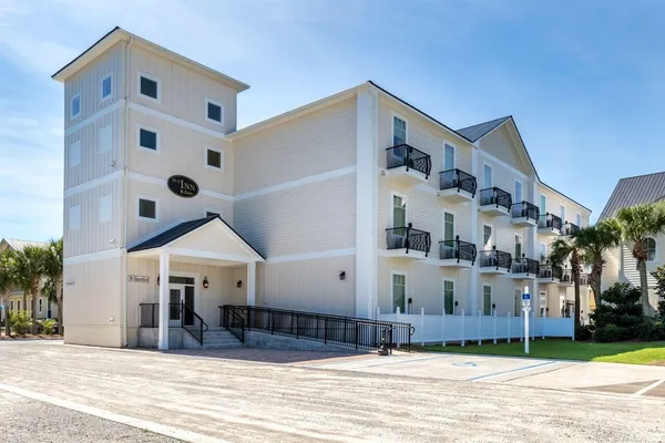 a view of a building with a street