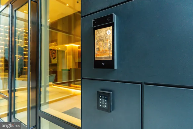 a living room with fireplace furniture and a chandelier