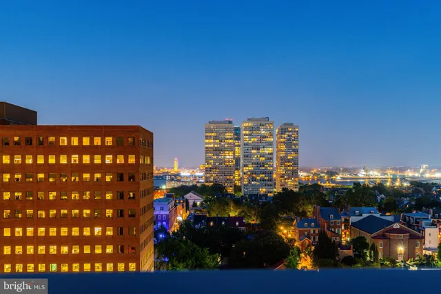 a view of a balcony next to a lake