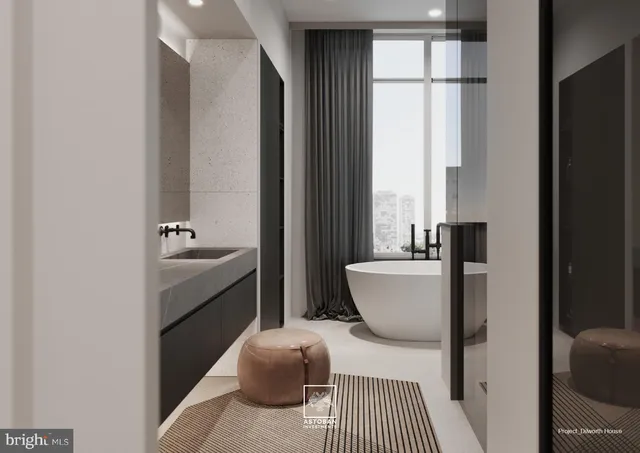 a spacious bathroom with a granite countertop sink