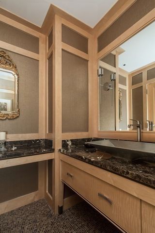 a view of kitchen stove sink and cabinets