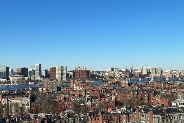 a view of a city with tall buildings
