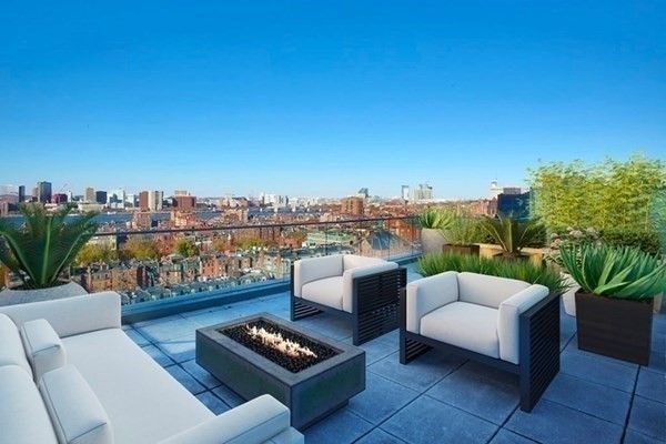 a view of a terrace with furniture