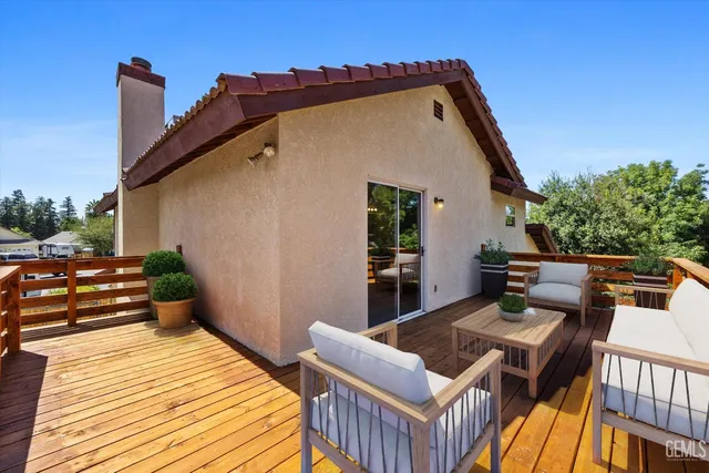 a view of outdoor space with wooden floor and yard