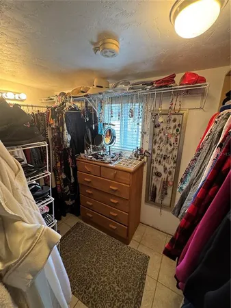 a bed room with a bed and a couch