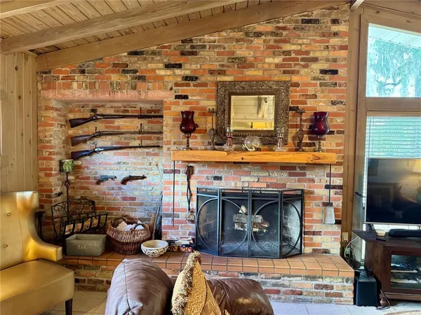 a kitchen with a sink and appliances