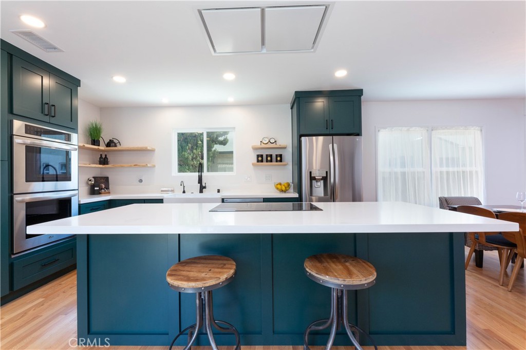 4907 East Arbor Road Long Beach, CA 90808 - Photo 15 of 47 Grand island with low profile venting and lighting