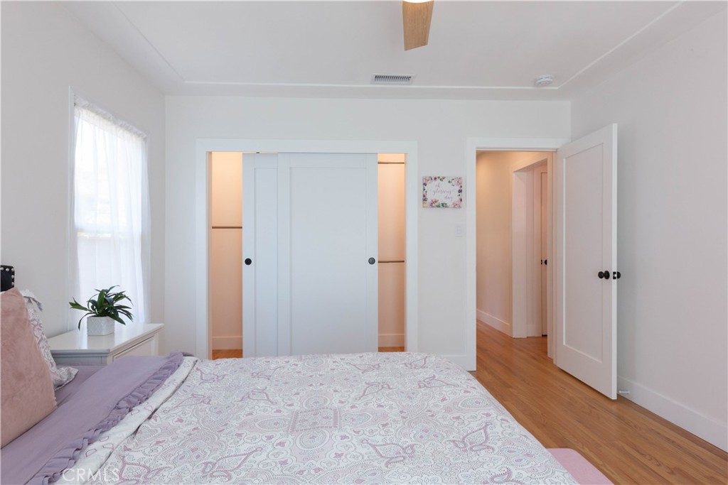 4907 East Arbor Road Long Beach, CA 90808 - Photo 21 of 47 Solid closet doors with closet organizer and lighting