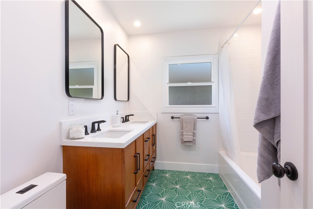 4907 East Arbor Road Long Beach, CA 90808 - Photo 24 of 47 Modern remodeled bathroom with double sink vanity