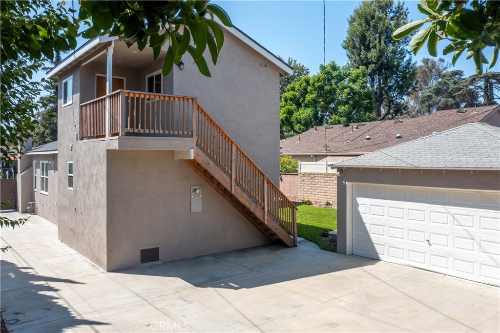 4907 East Arbor Road Long Beach, CA 90808 - Photo 43 of 47 Stairs lead to spacious, separate bonus room