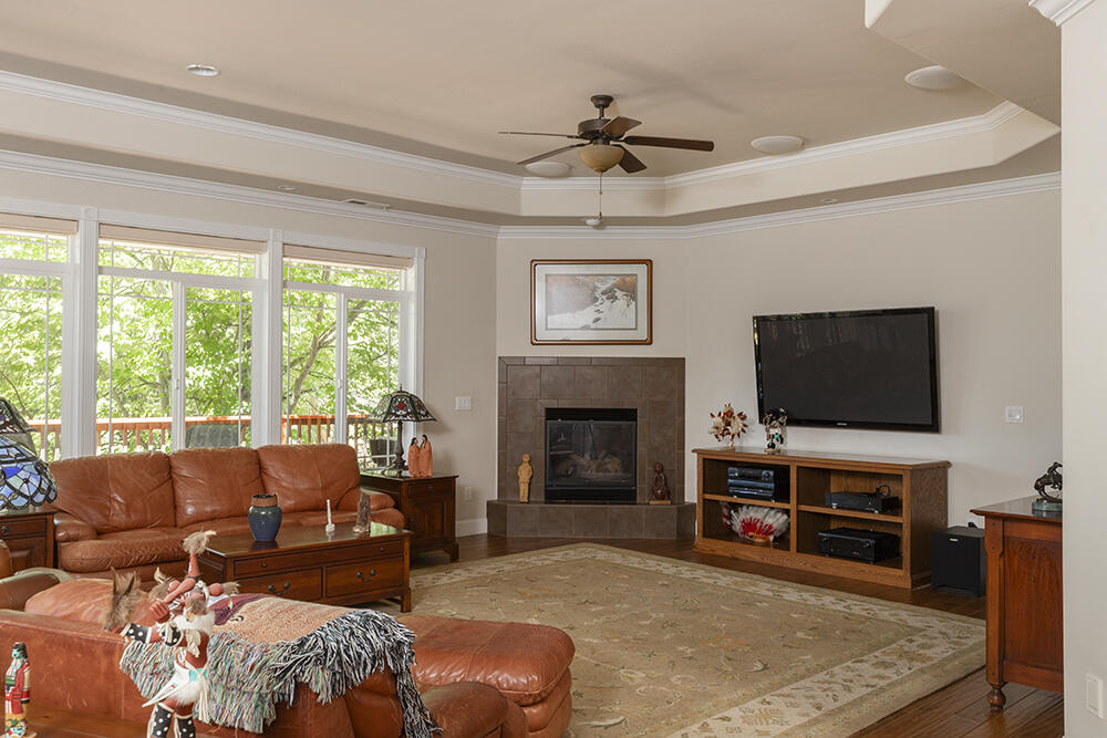 1280 Marcy Loop Road Grants Pass, OR 97527 - Photo 3 of 25 a living room with furniture and a flat screen tv