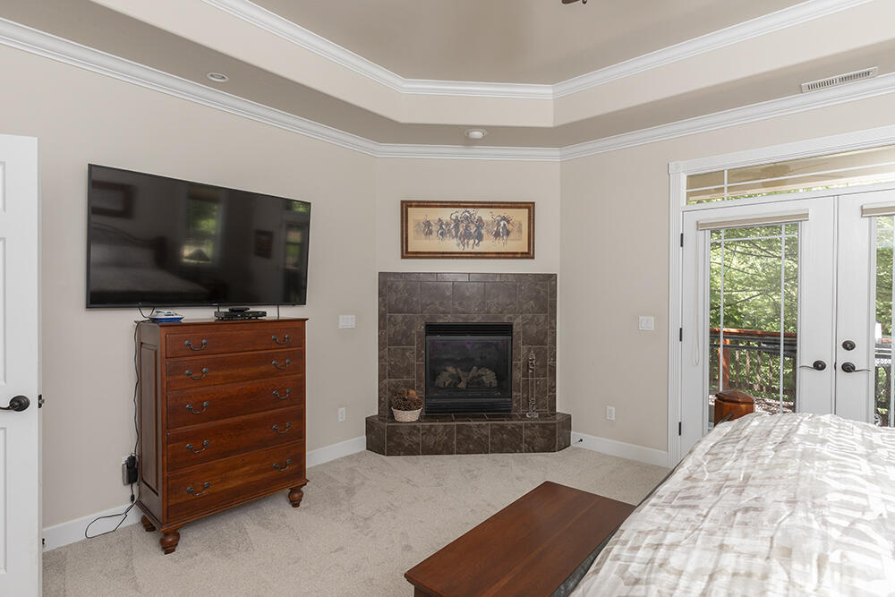 1280 Marcy Loop Road Grants Pass, OR 97527 - Photo 10 of 25 a living room with furniture and a flat screen tv