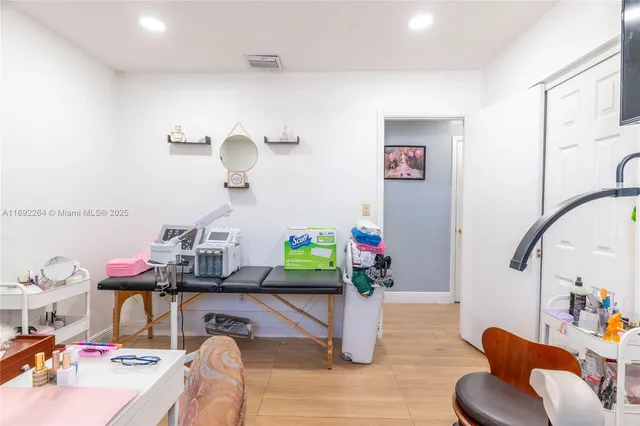 a room with furniture and gym equipment