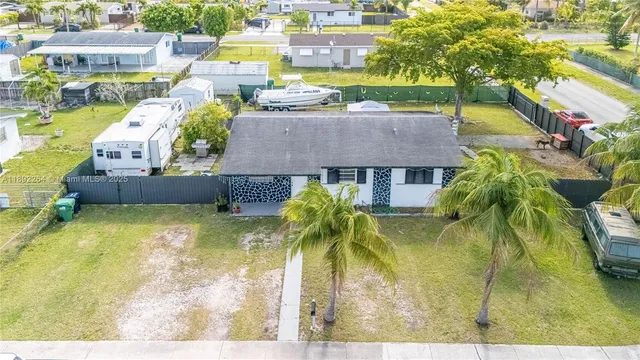a view of swimming pool with a patio