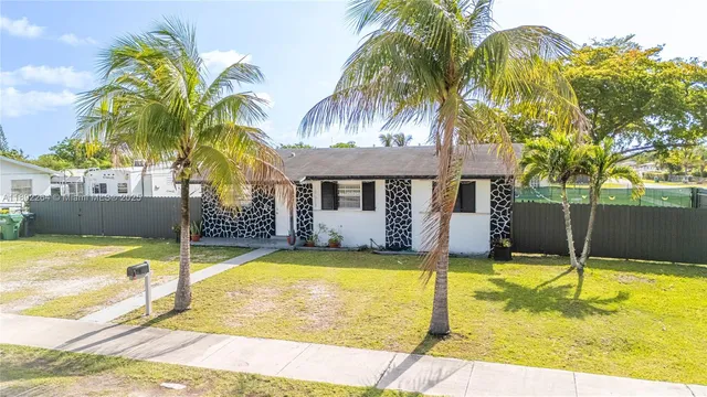 a view of a house with swimming pool