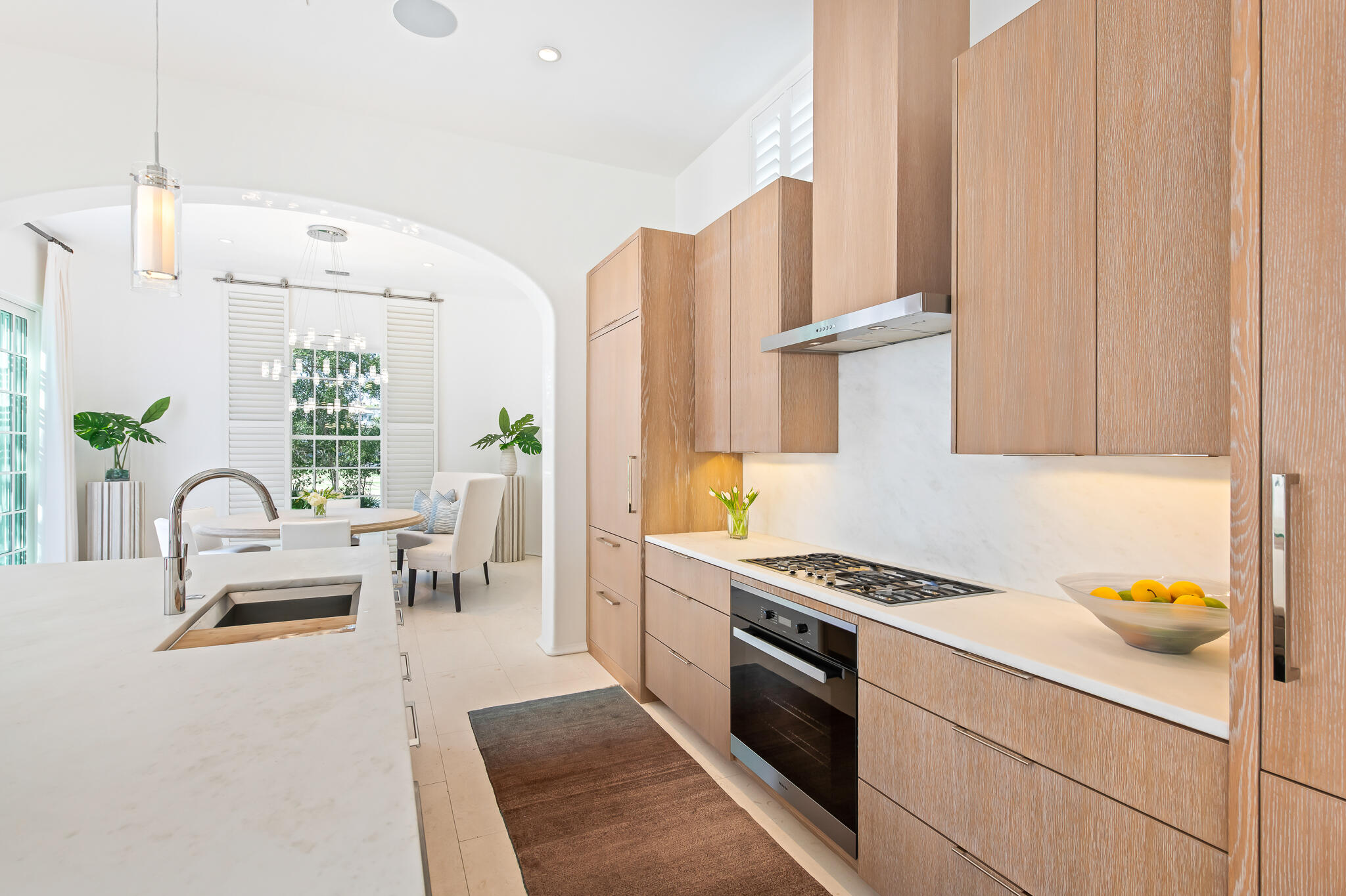 75 Featherbed Alley Inlet Beach, FL 32461 - Photo 22 of 49 a kitchen with stainless steel appliances granite countertop a stove a sink and a refrigerator