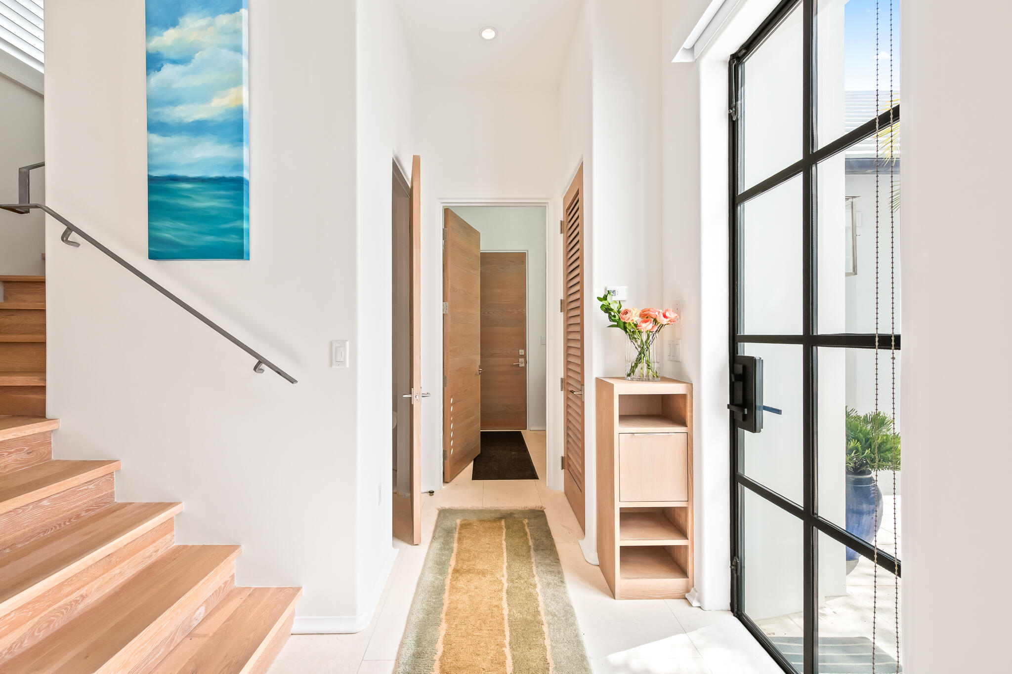 75 Featherbed Alley Inlet Beach, FL 32461 - Photo 23 of 49 a view of an entryway with wooden floor and a rug