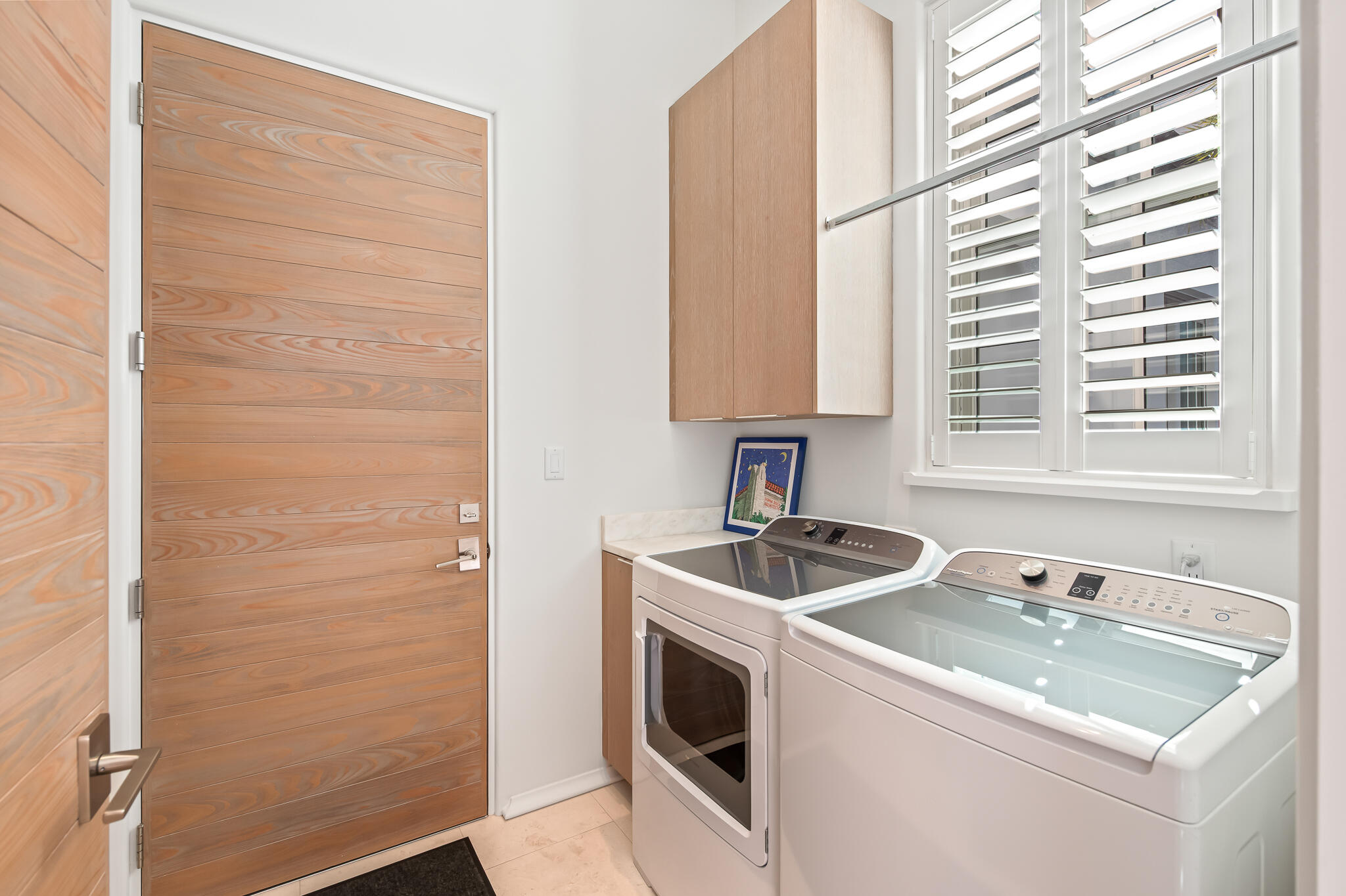 75 Featherbed Alley Inlet Beach, FL 32461 - Photo 24 of 49 a utility room with sink dryer and washer