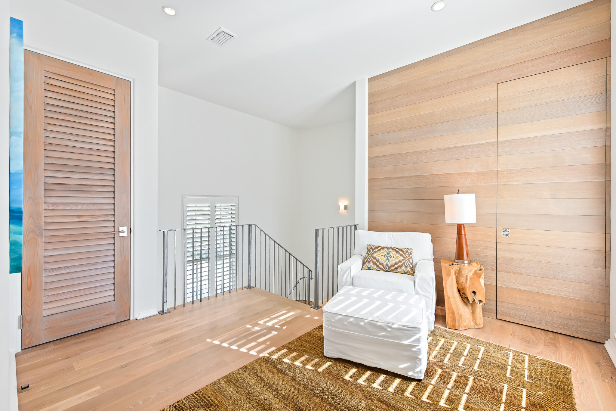 75 Featherbed Alley Inlet Beach, FL 32461 - Photo 27 of 49 a bedroom with a bed and wooden floor