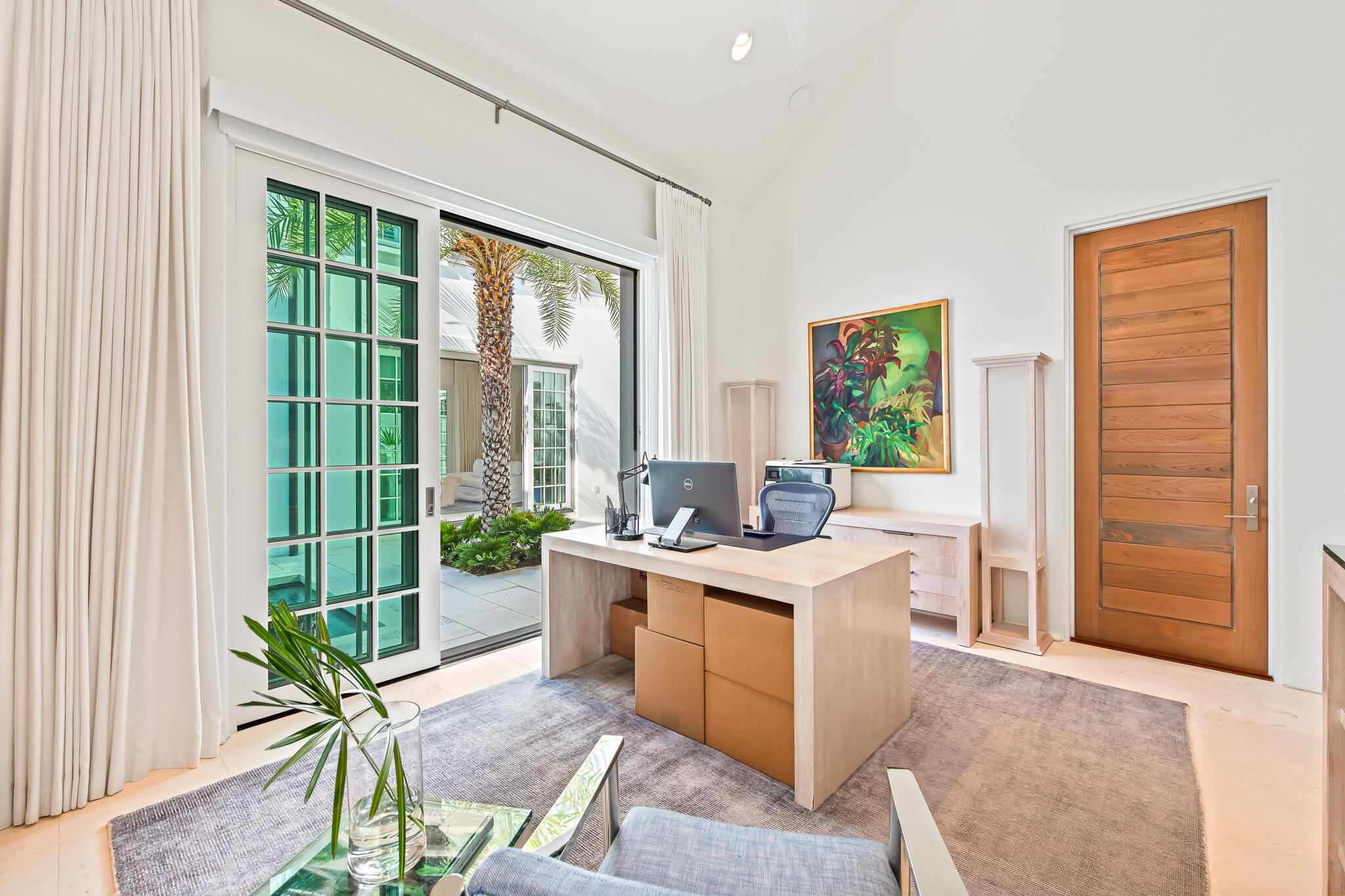 75 Featherbed Alley Inlet Beach, FL 32461 - Photo 36 of 49 a view of a kitchen with a sink wooden cabinets and a window