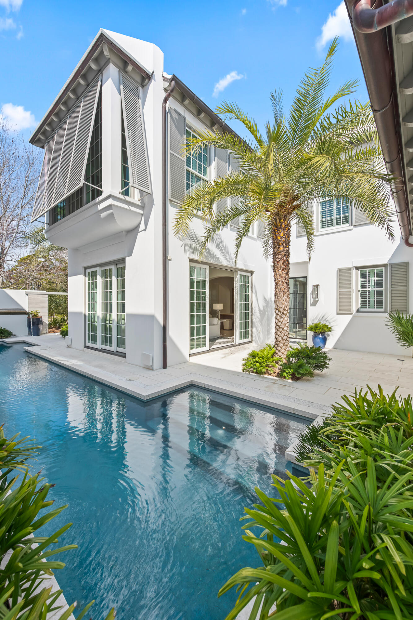 75 Featherbed Alley Inlet Beach, FL 32461 - Photo 4 of 49 a view of a white building with a swimming pool
