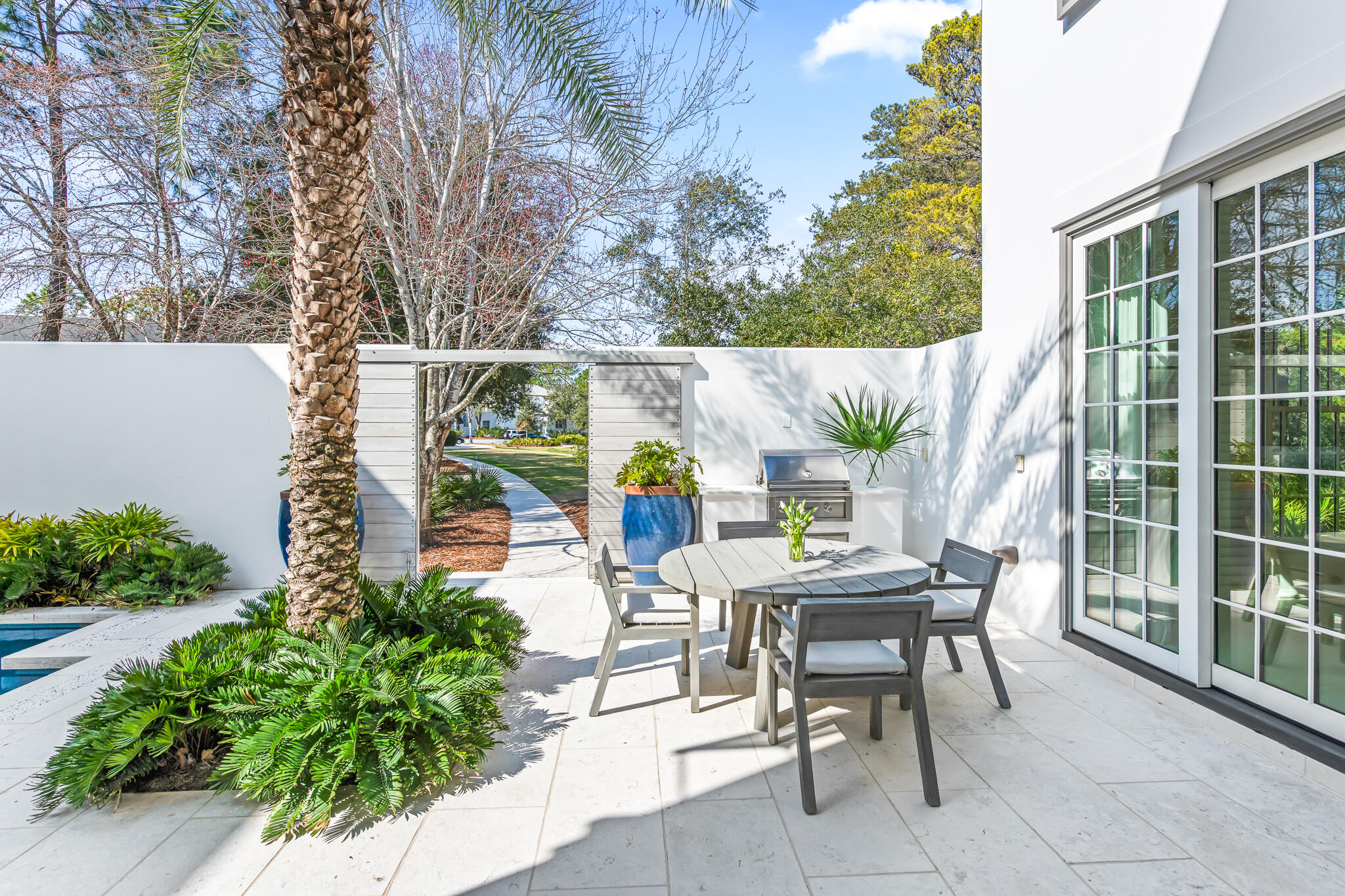 75 Featherbed Alley Inlet Beach, FL 32461 - Photo 10 of 49 a balcony with furniture and a potted plant