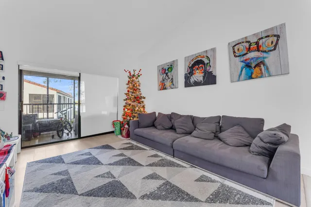 a living room with furniture and a couch