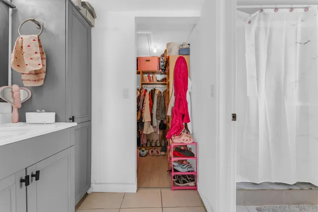 a view of a closet with storage
