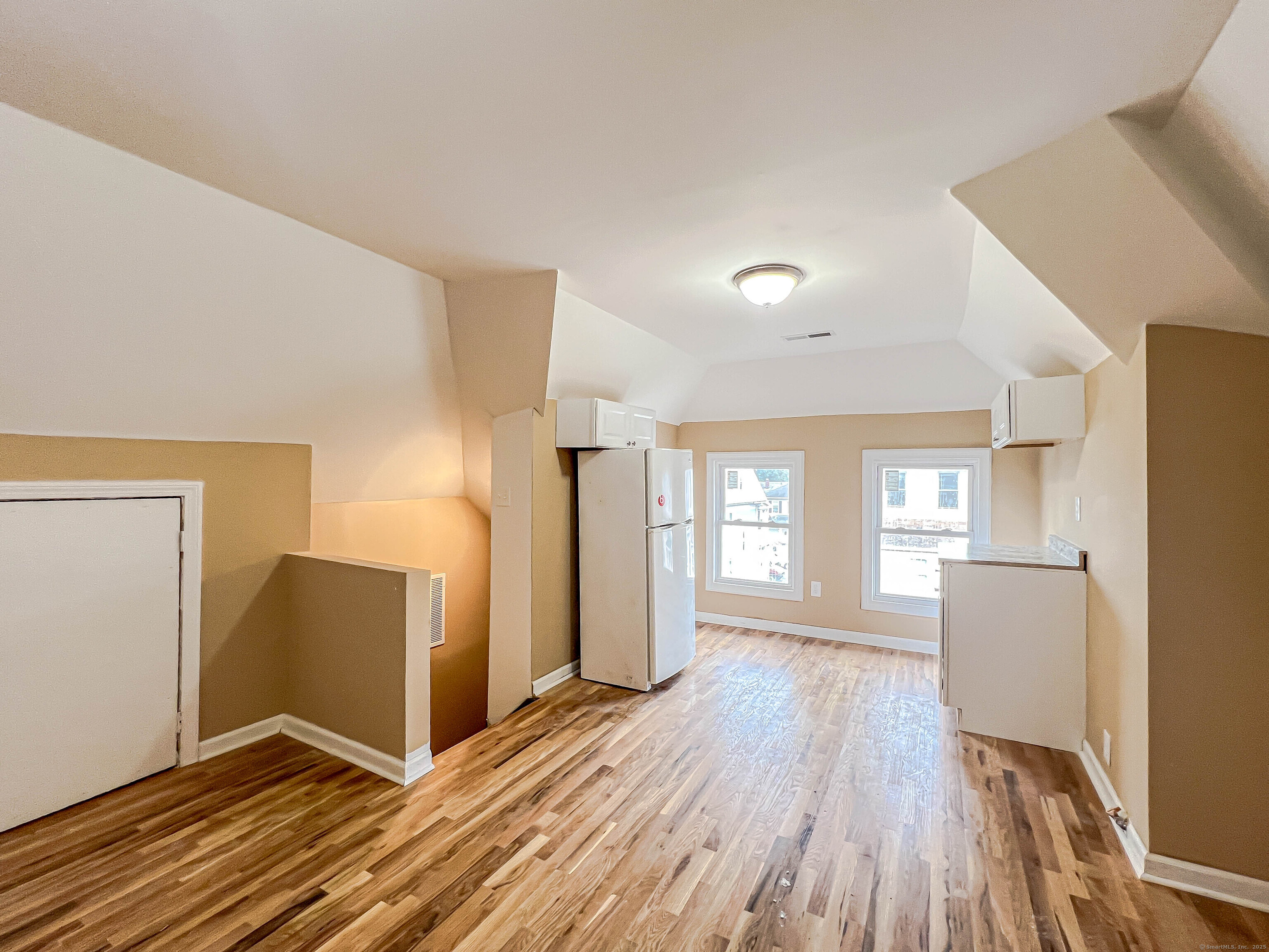 63 Eaton Street, Unit 3 Bridgeport, CT 06604 - Photo 5 of 11 a view of a livingroom with wooden floor