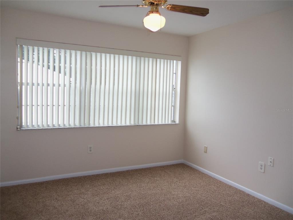 2786 Curry Ford Road, Unit 6B Orlando, FL 32806 - Photo 8 of 27 an empty room with a window