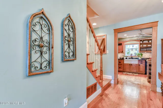 a kitchen with stainless steel appliances granite countertop a stove and a sink