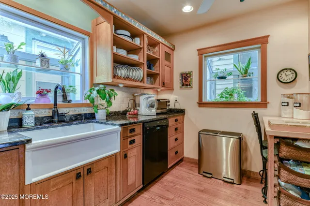 a bedroom with a bed and a book shelf
