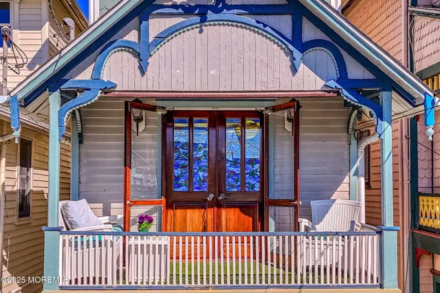 a bathroom with a sink toilet vanity and shower