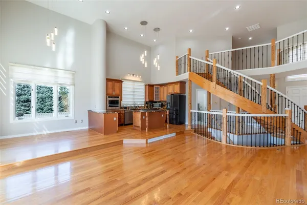 a view of livingroom with furniture and floor to ceiling window
