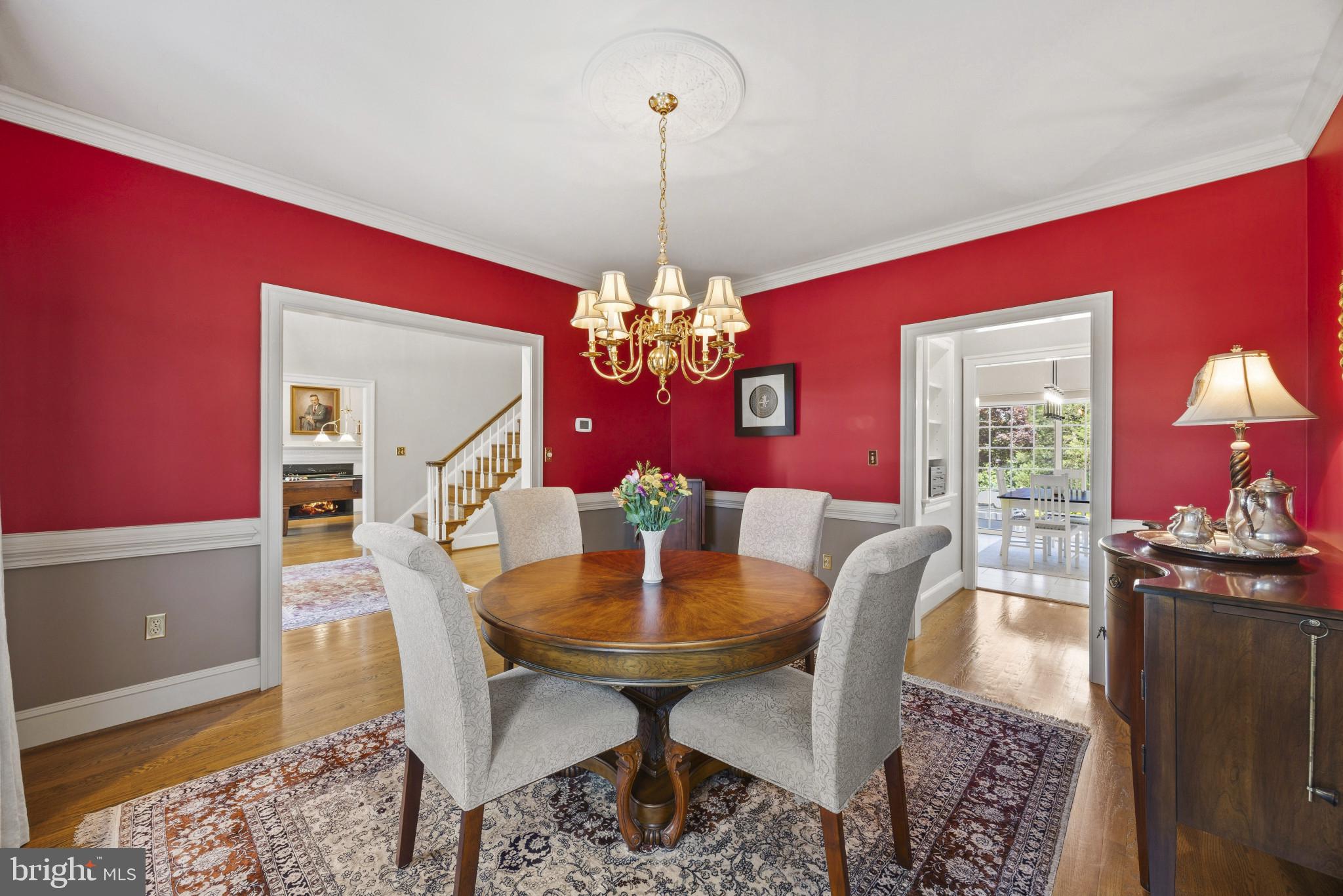 3403 Hidden River View Road Annapolis, MD 21403 - Photo 8 of 50 a view of a dining room with furniture and chandelier