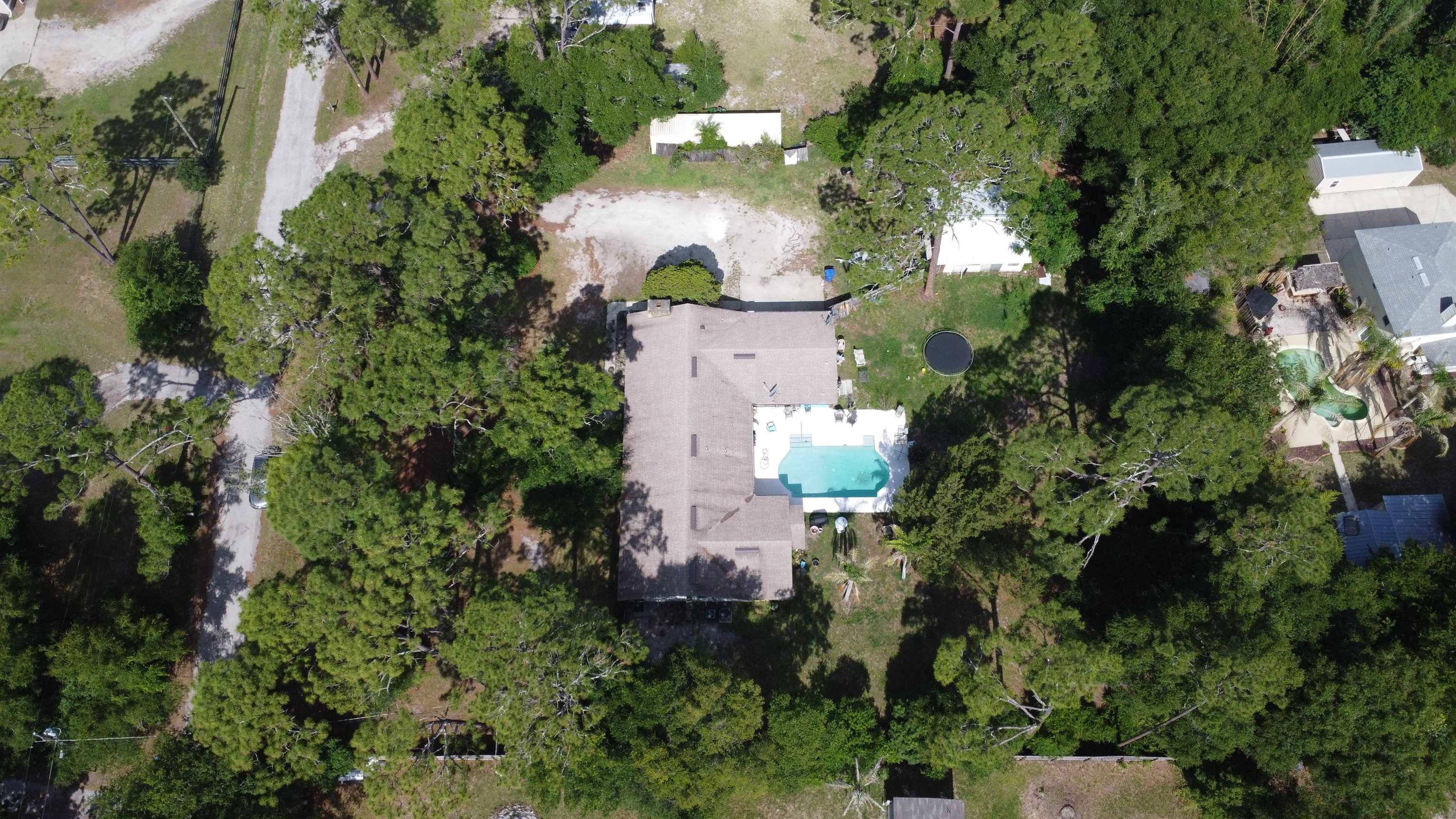 554 Hayley Road St. Augustine, FL 32086 - Photo 45 of 46 an aerial view of a house with a yard and garden