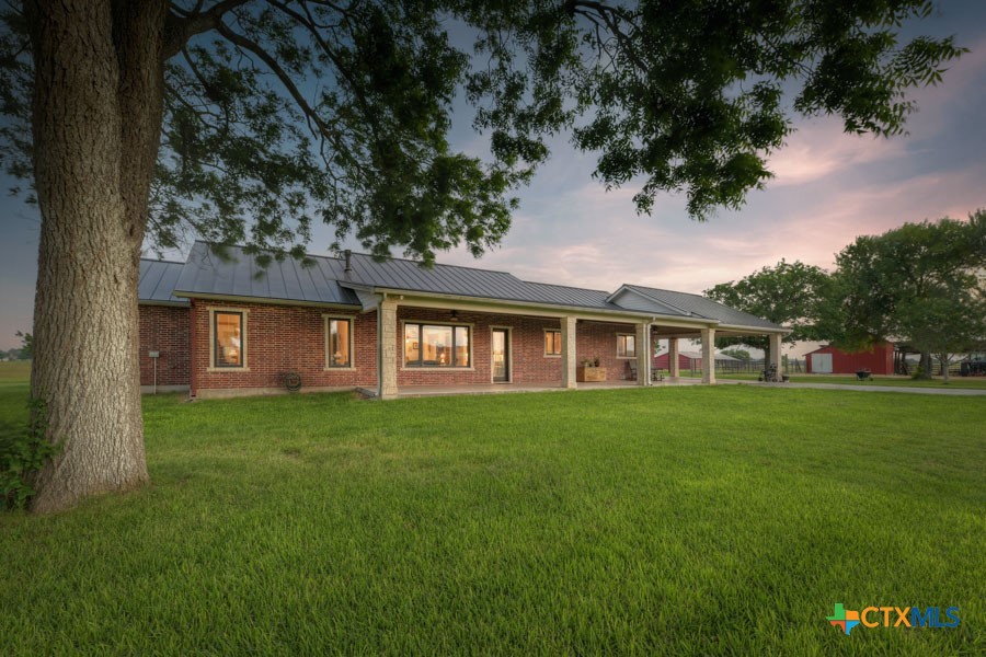 2420 Bolton Road Marion, TX 78124 - Photo 21 of 30 a front view of a house with a garden