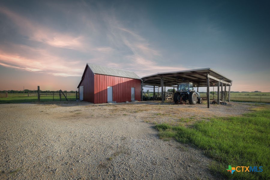 2420 Bolton Road Marion, TX 78124 - Photo 25 of 30 a view of a house with backyard and sitting area