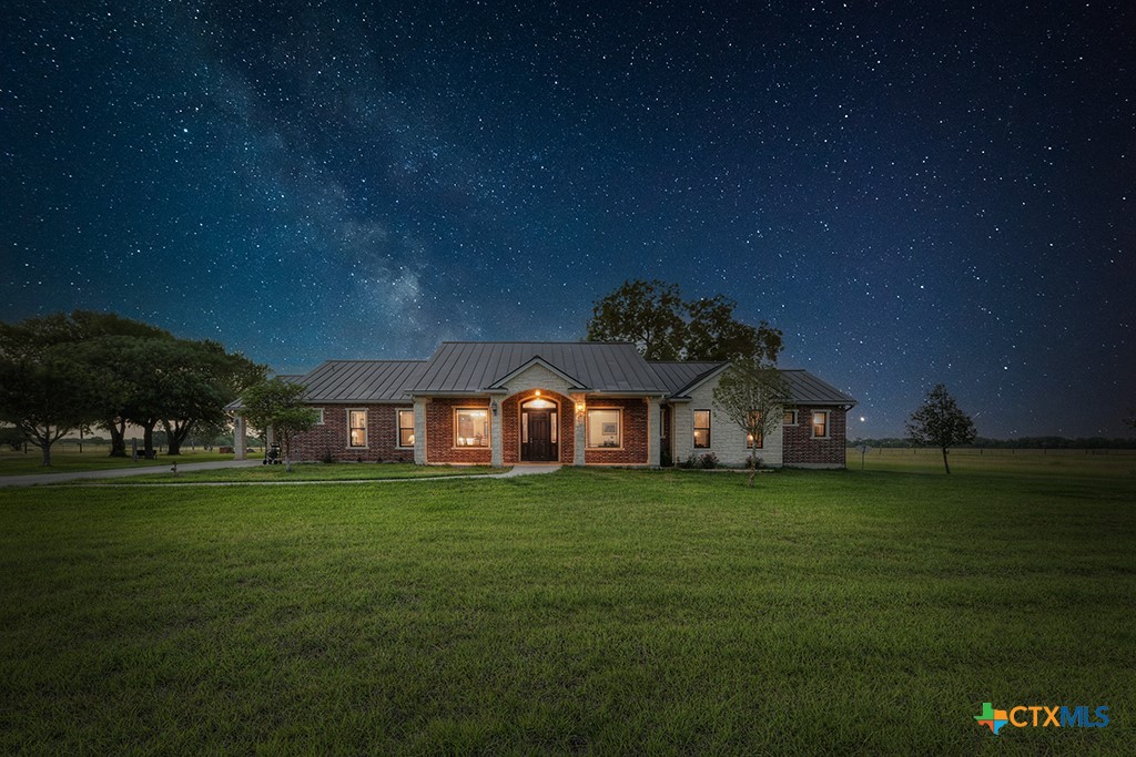2420 Bolton Road Marion, TX 78124 - Photo 30 of 30 a front view of a house with a garden