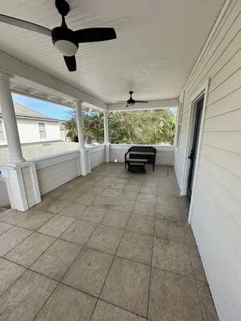 a view of open kitchen with furniture and window