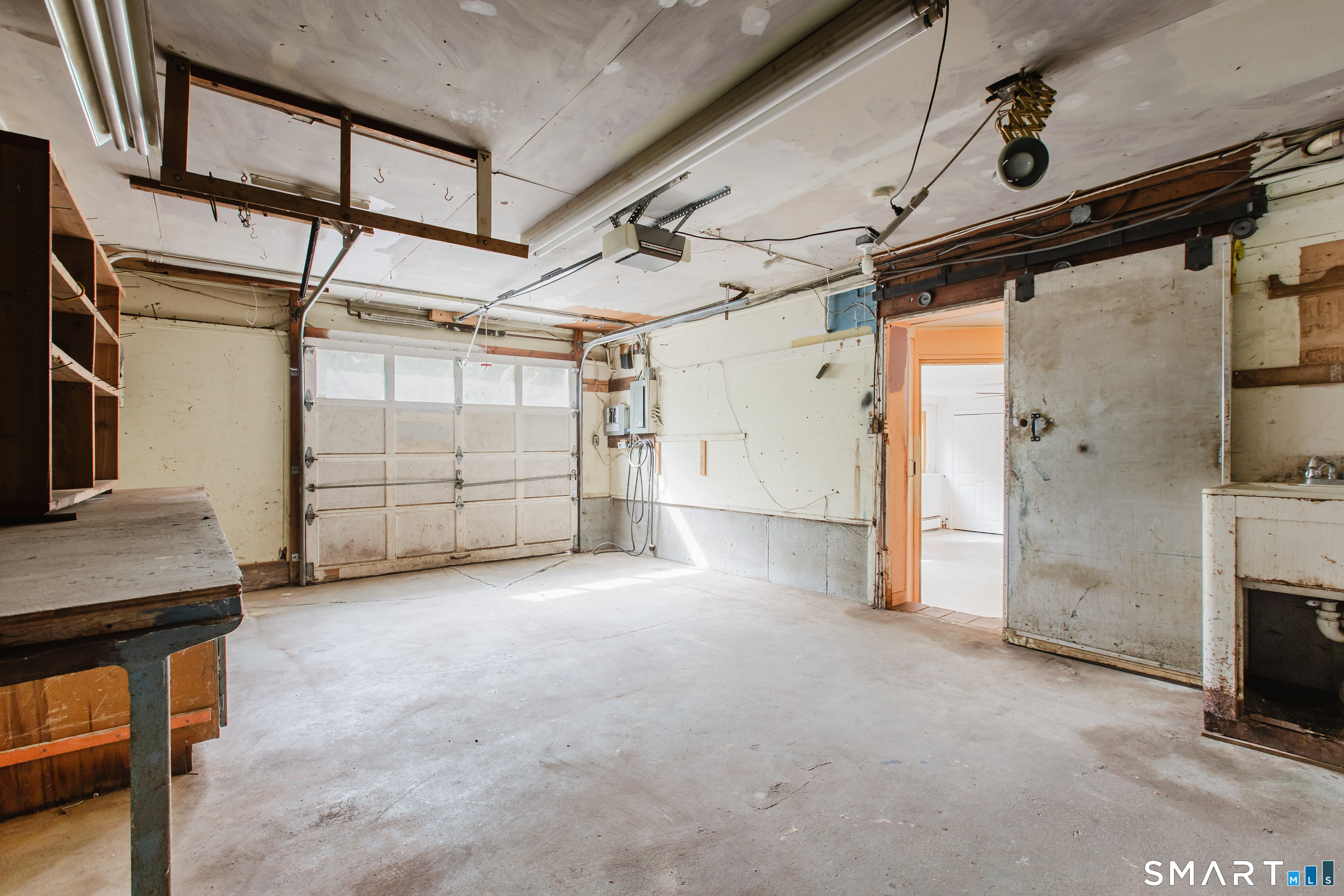 75 Westwood Road Stamford, CT 06902 - Photo 28 of 40 Large 1-car Garage w/ storage room