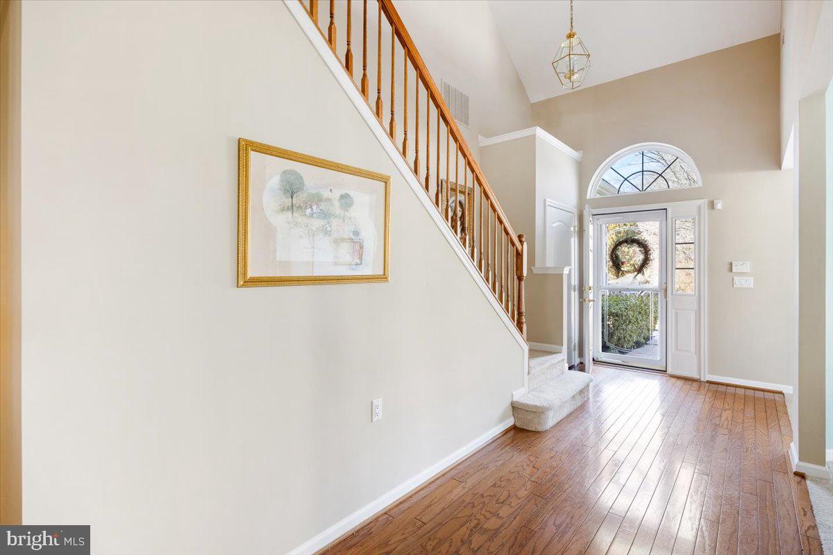 131 Lowell Drive Marlton, NJ 08053 - Photo 17 of 60 a view of entryway with wooden floor