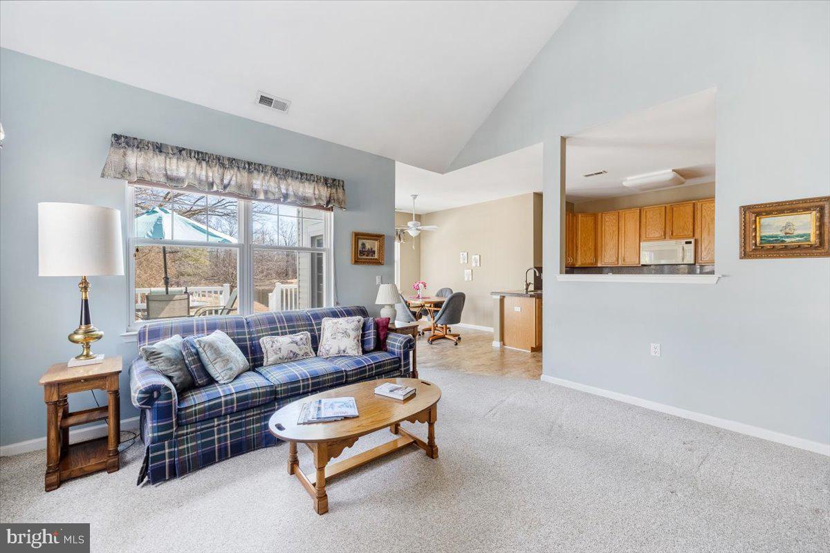 131 Lowell Drive Marlton, NJ 08053 - Photo 20 of 60 a living room with furniture and a large window