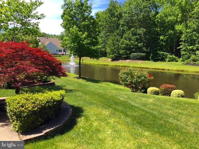 131 Lowell Drive Marlton, NJ 08053 - Photo 2 of 60 a view of a house with a yard and sitting area