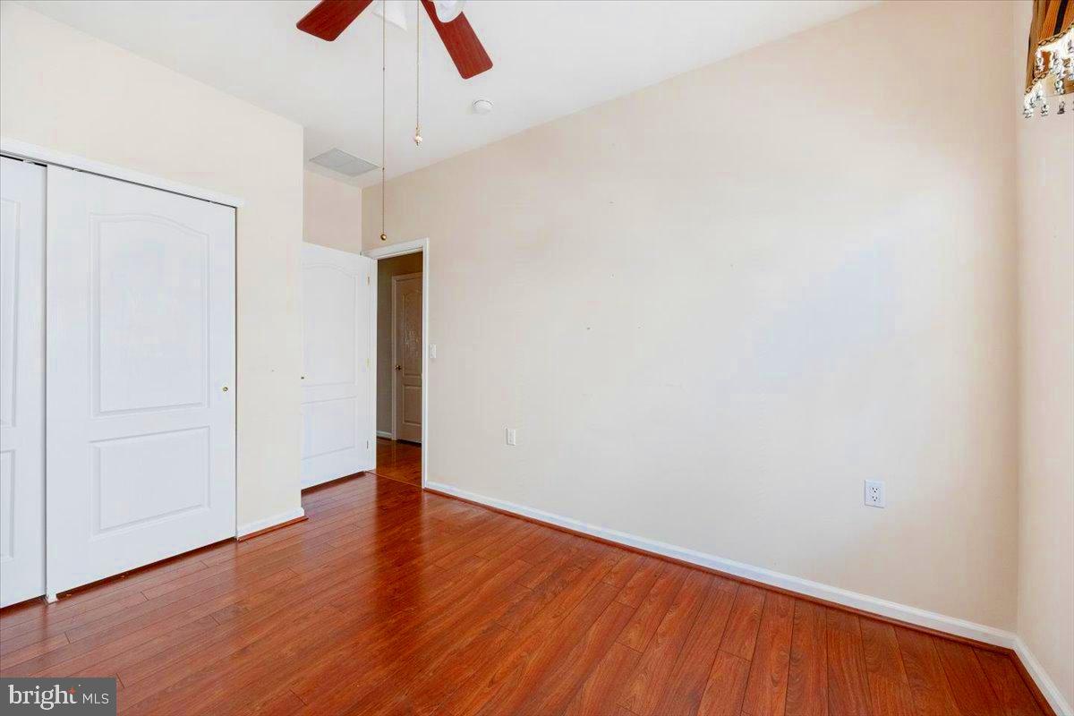 131 Lowell Drive Marlton, NJ 08053 - Photo 27 of 60 a view of an empty room with wooden floor