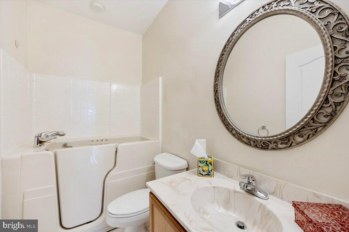 131 Lowell Drive Marlton, NJ 08053 - Photo 28 of 60 a bathroom with a sink mirror and toilet