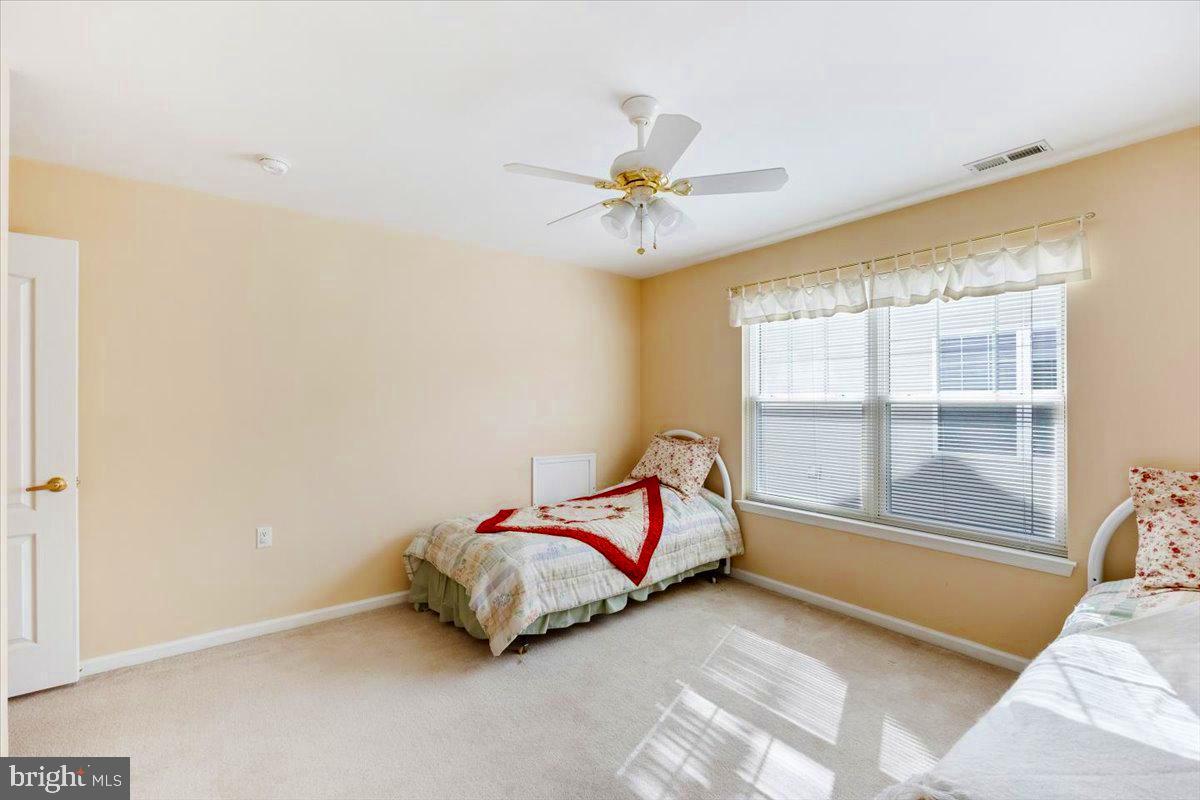 131 Lowell Drive Marlton, NJ 08053 - Photo 38 of 60 a bedroom with a bed and a window